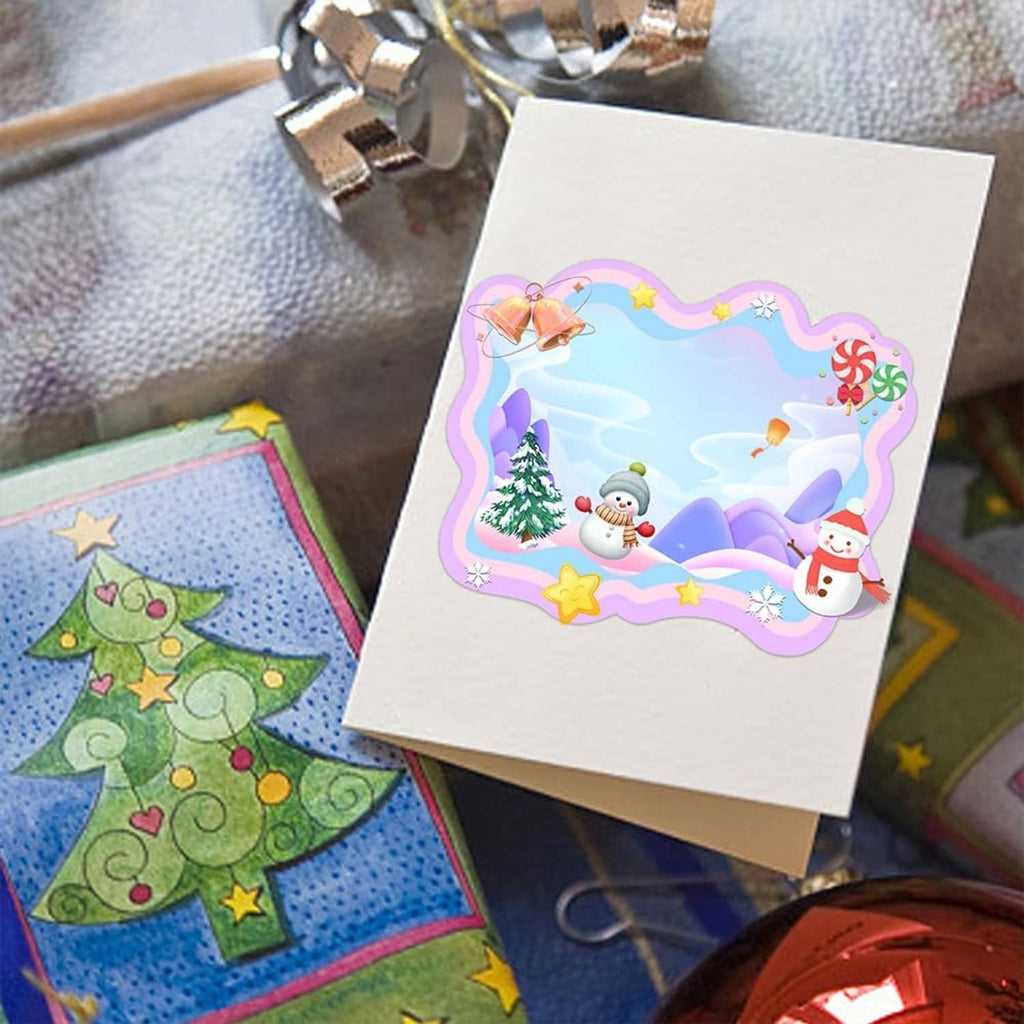 Stack of holiday greeting cards with purple wavy frame cutout borders