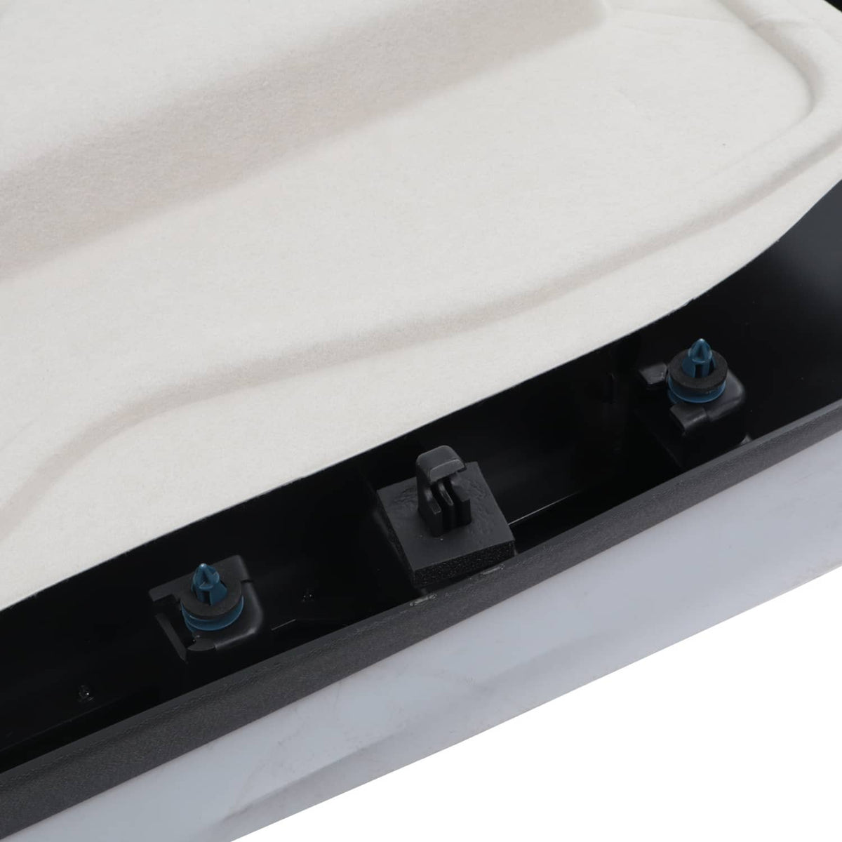 Row of inner door trim clips and plastic retainers along the edge on light backing.