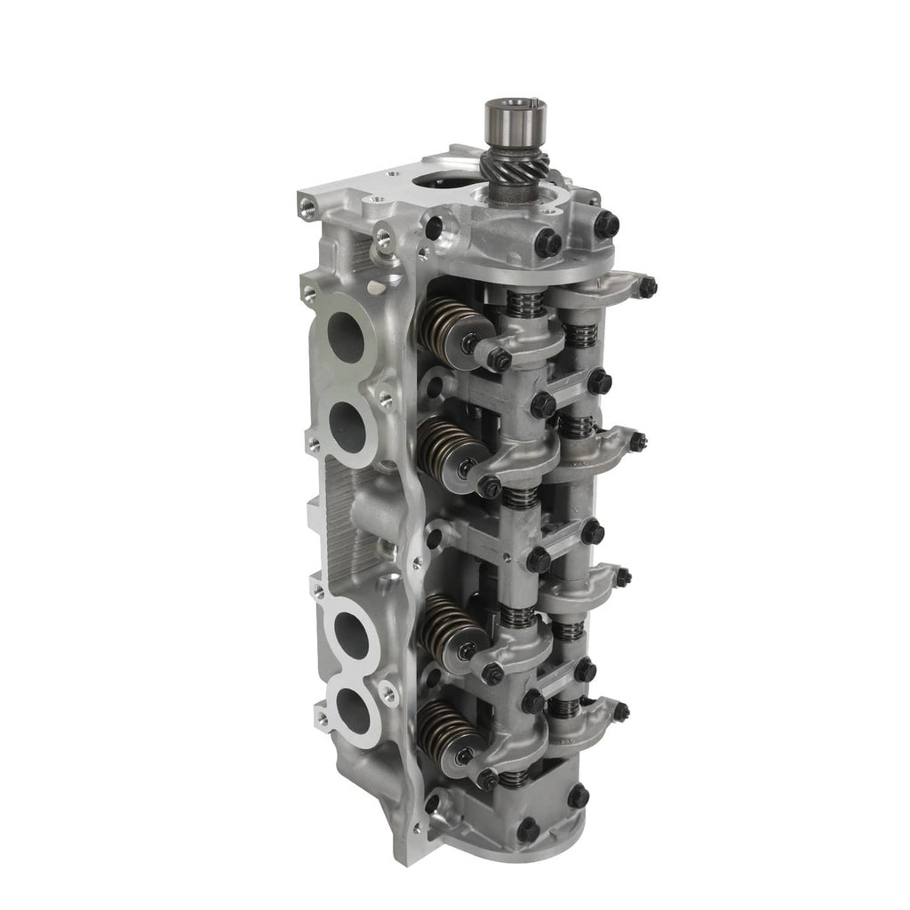 Complete mechanical cylinder head assembly with rocker arms and springs, metallic silver