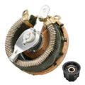 Close-up of wirewound rheostat: ceramic base, coiled resistor, and metal terminals
