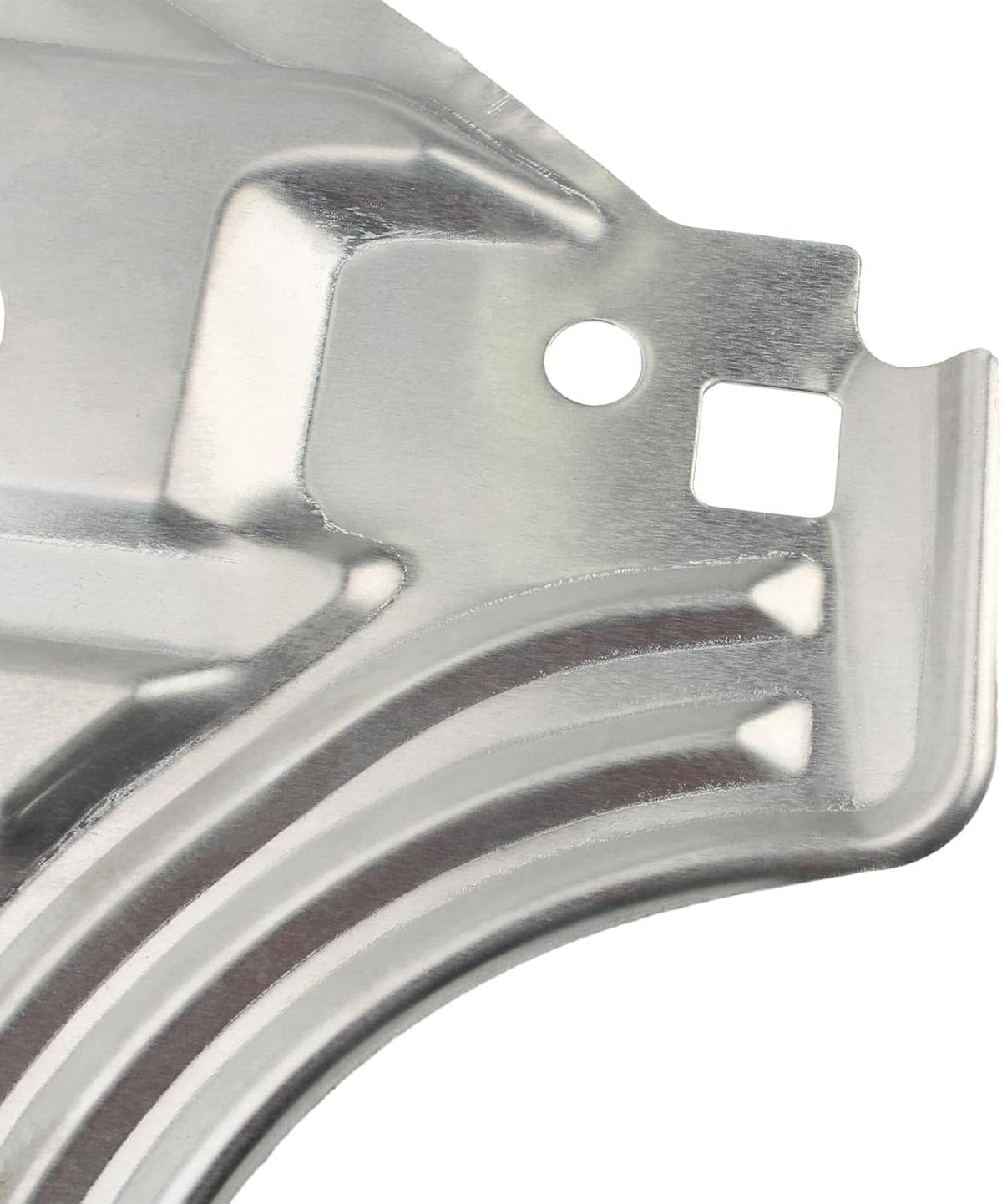 Close-up of silver engine splash guard panel with curved flange and mounting cutout