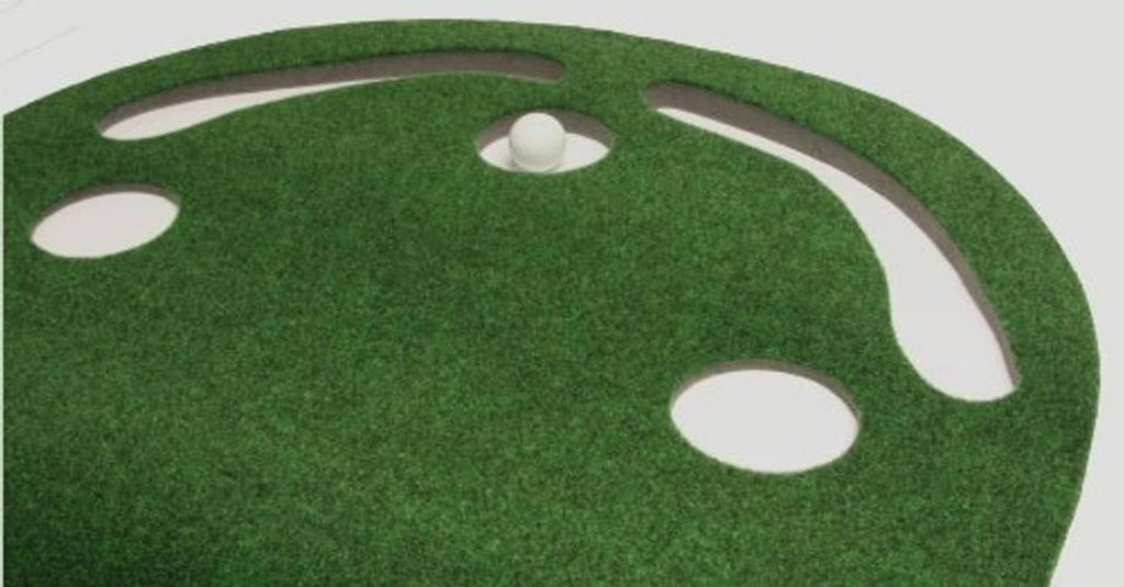 Dark green putting surface with multiple white cup holes for golf balls