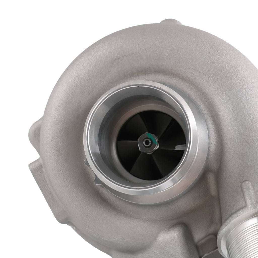 Turbocharger compressor inlet close-up with fan wheel visible inside