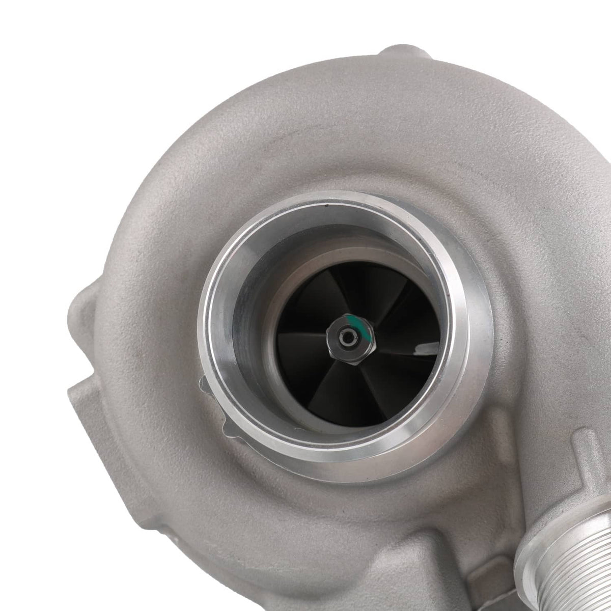 Turbocharger compressor inlet close-up with fan wheel visible inside