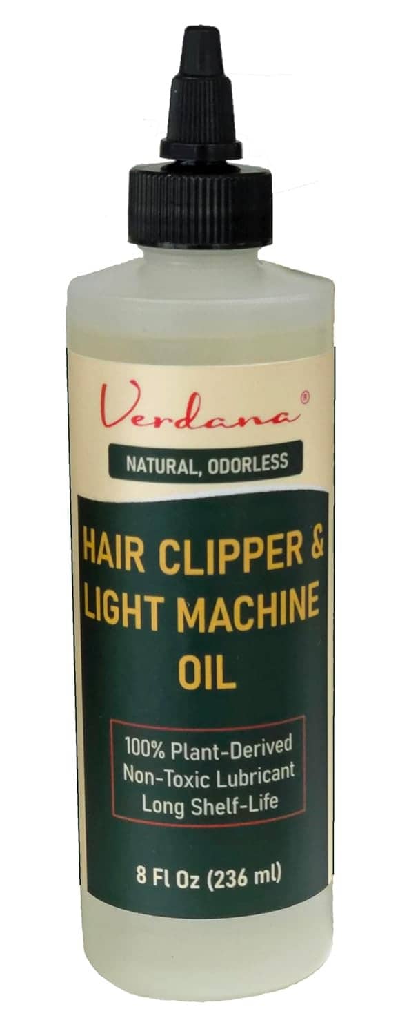 Hair clipper and light machine oil bottle with black dispensing cap