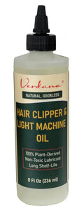 Hair clipper and light machine oil bottle with black dispensing cap