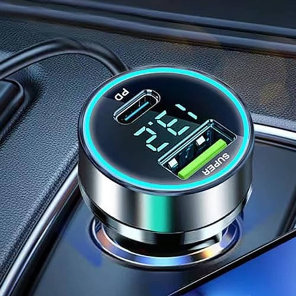 Car USB-C charger adapter close-up with circular LED voltage screen on dashboard