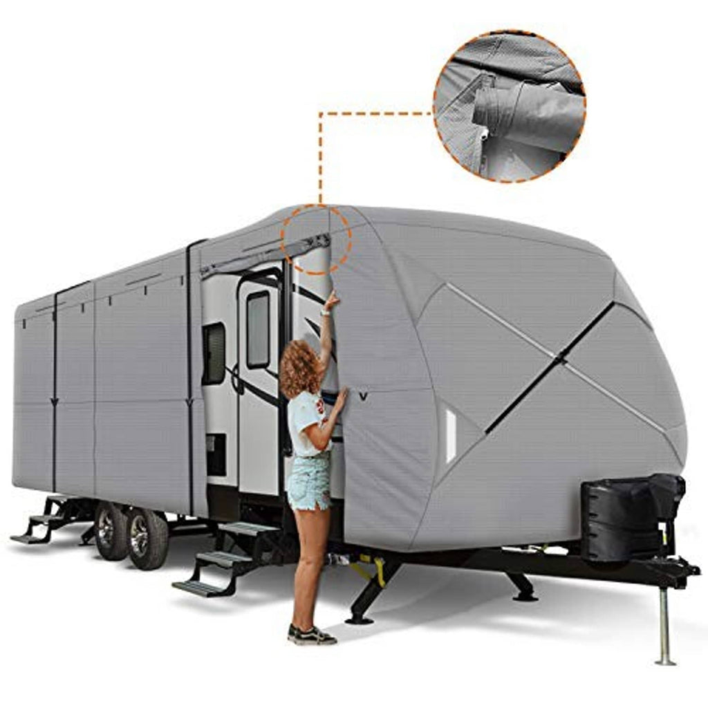 Grey travel trailer cover with arched roof and side entrance flap, person beside trailer
