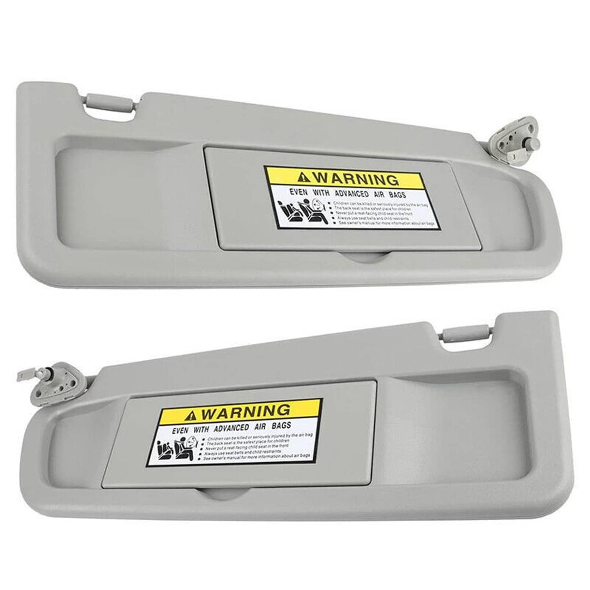 Gray driver and passenger side sun visors with warning labels and hinge brackets
