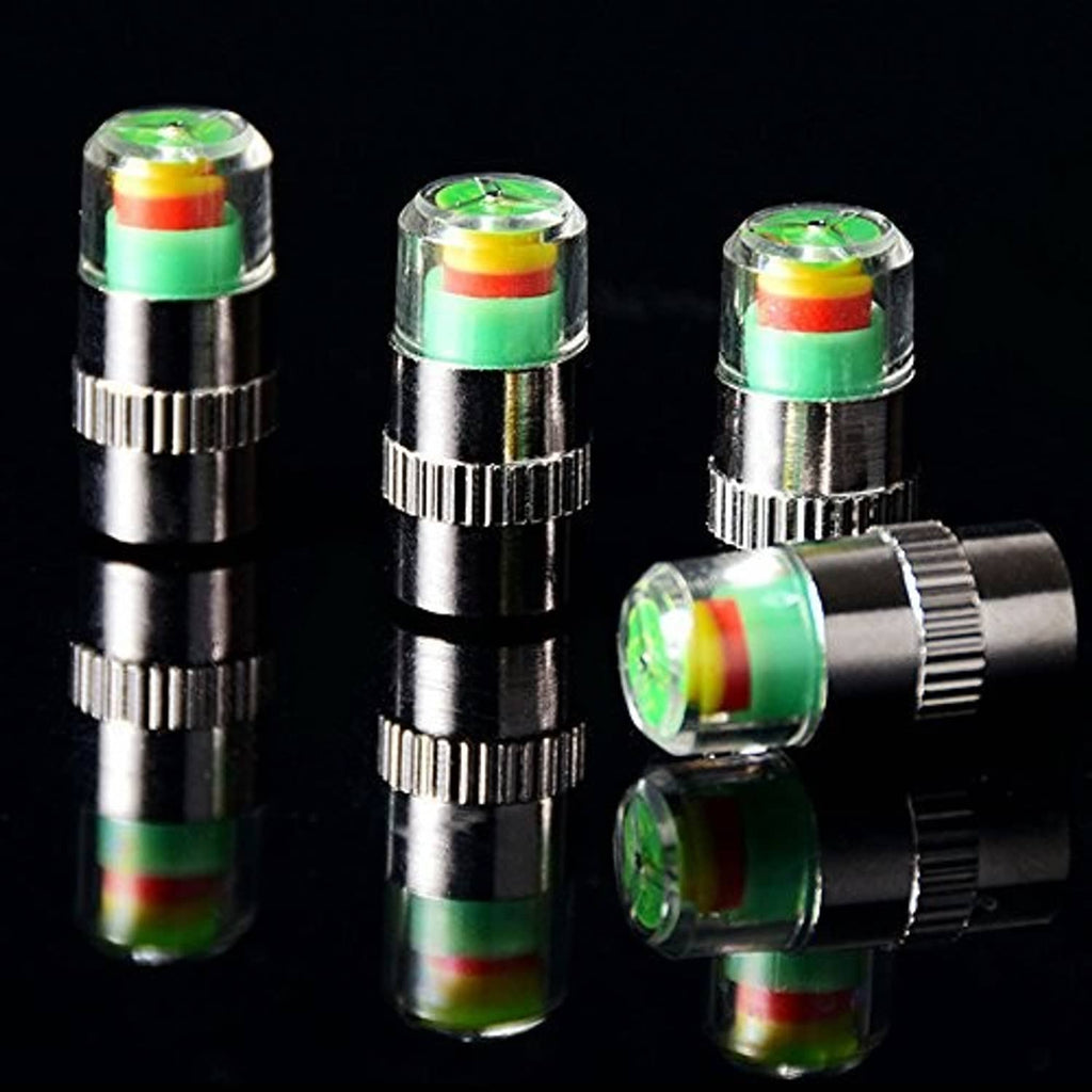 Tire valve stem caps set showing silver metal caps with green and red indicator bands