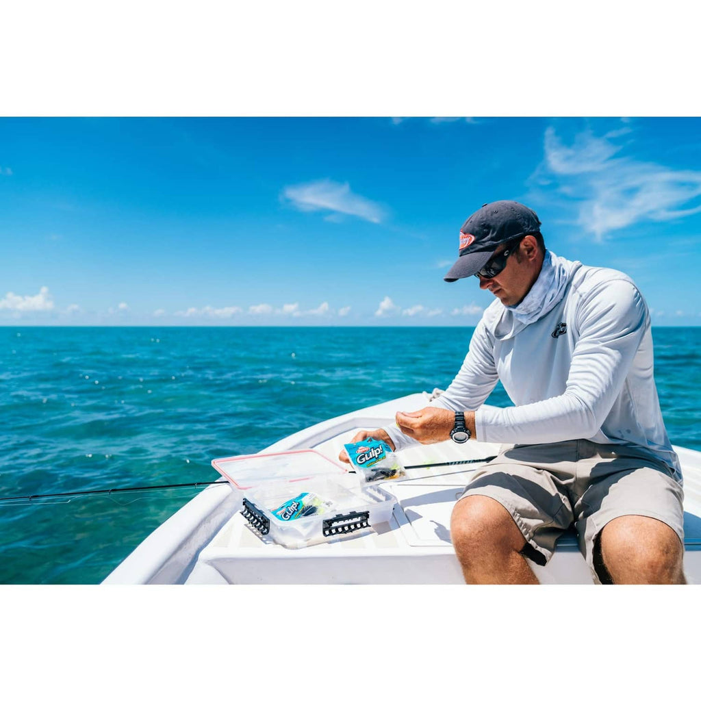 Angler holding Berkley Gulp bait pouches on a boat