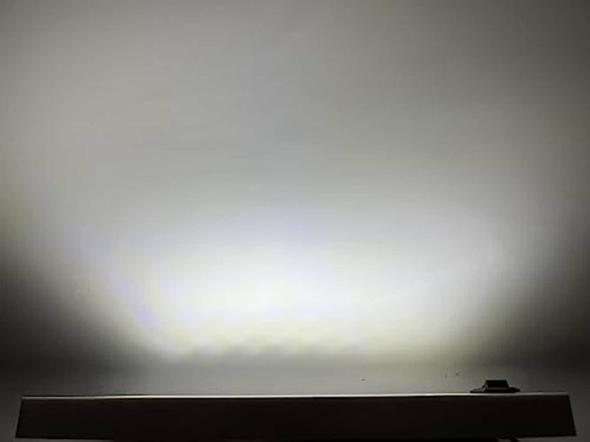 Bright white rectangular LED ceiling light glow from the mounted unit