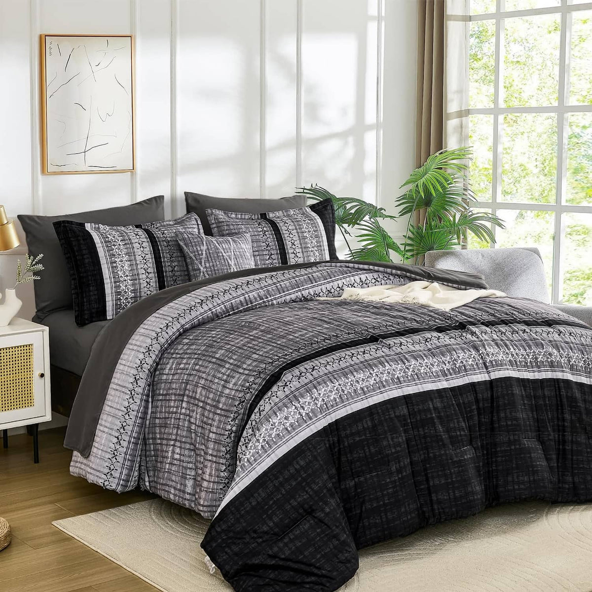 Black and gray comforter set with geometric border and striped pattern, king size