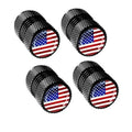 Set of four black knurled metal tire valve stem covers with round US flag tops