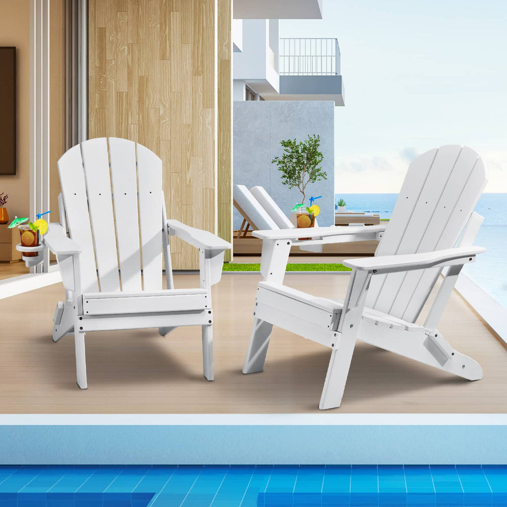 Set of 2 white folding Adirondack patio chairs with slatted seats and armrests