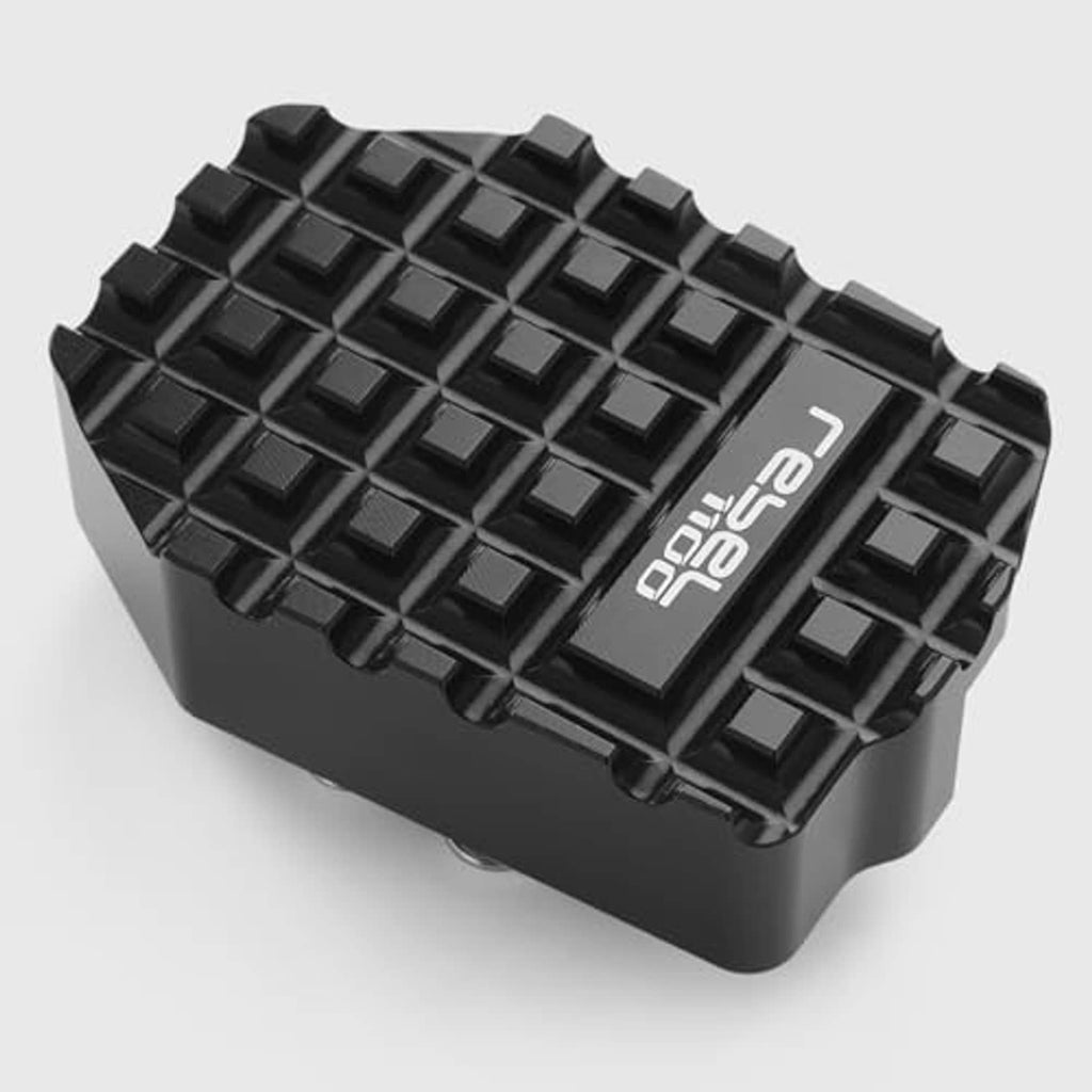 Black rear brake pedal extension block with angled textured tread