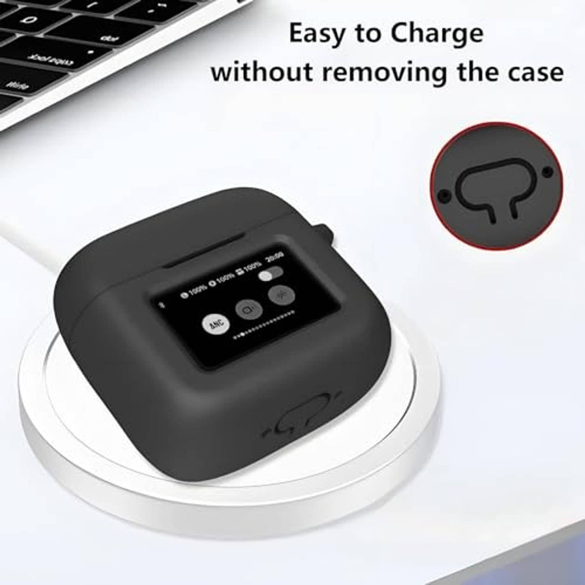 Black earbuds charging case on a charging pad, side port opening visible