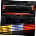 Quad-row LED tailgate light bar with amber turn signals and red/white light grid