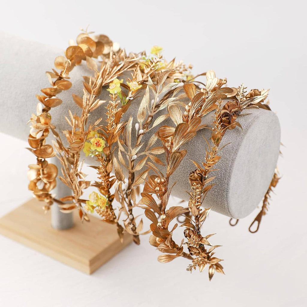 Gold leaf hair wreath with dense leaf sprigs and small blossoms, on headform