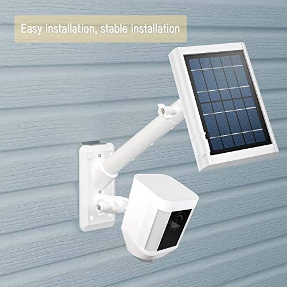 White solar spotlight camera with solar panel on a wall-mounted bracket, angled position