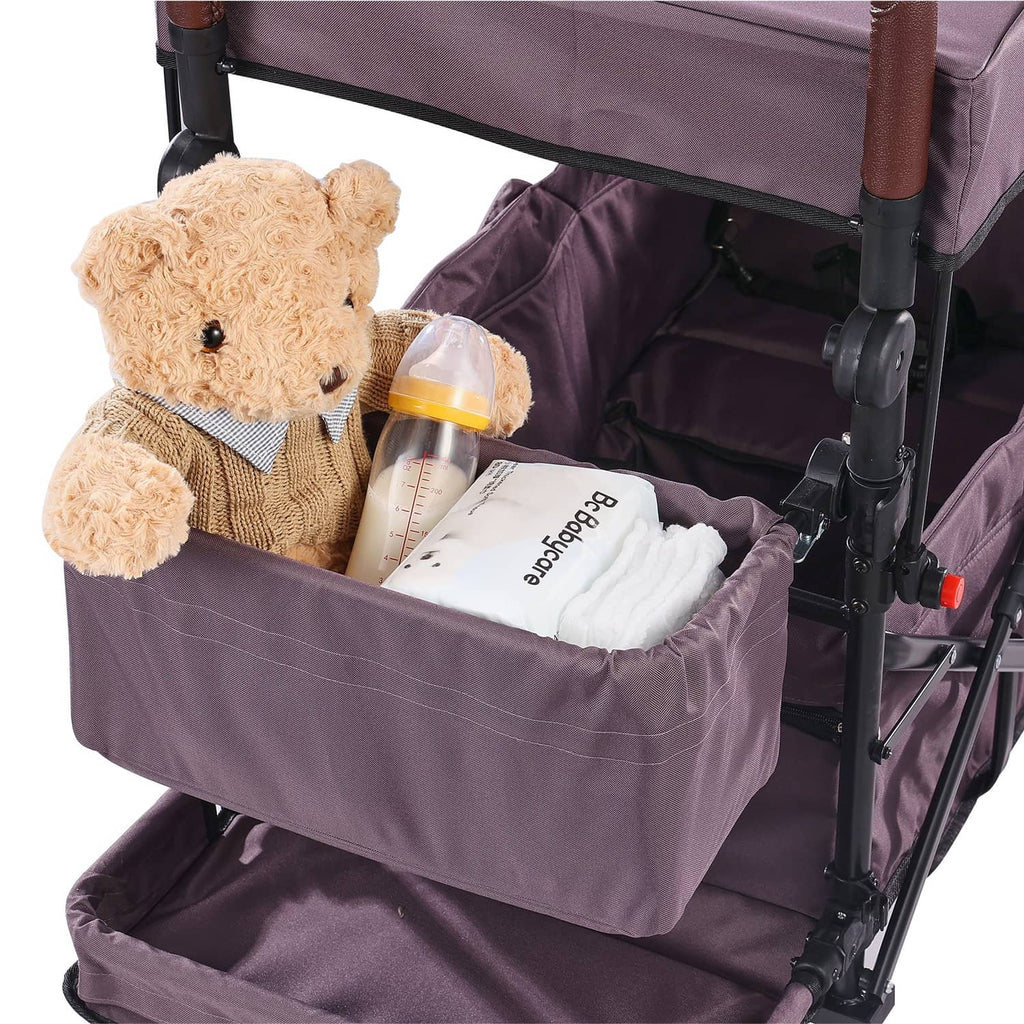 Purple double stroller wagon with canopy, front storage basket, and safety frame