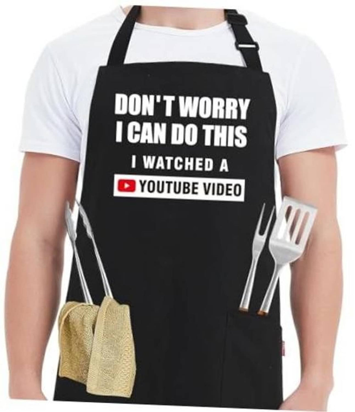 Black kitchen apron with bold quote and YouTube video badge, with utensil pocket detail