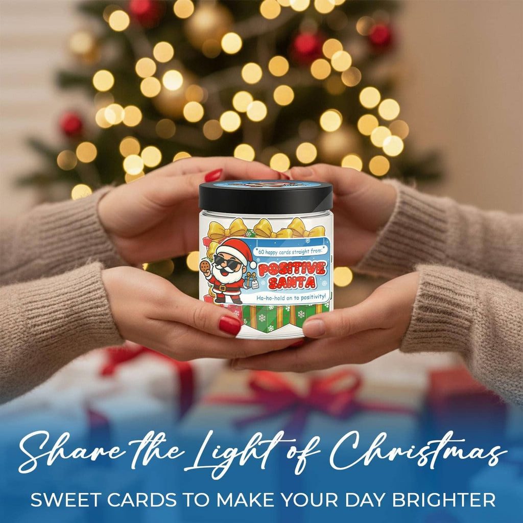 Hands holding Santa-themed affirmation card jar with black lid and colorful label