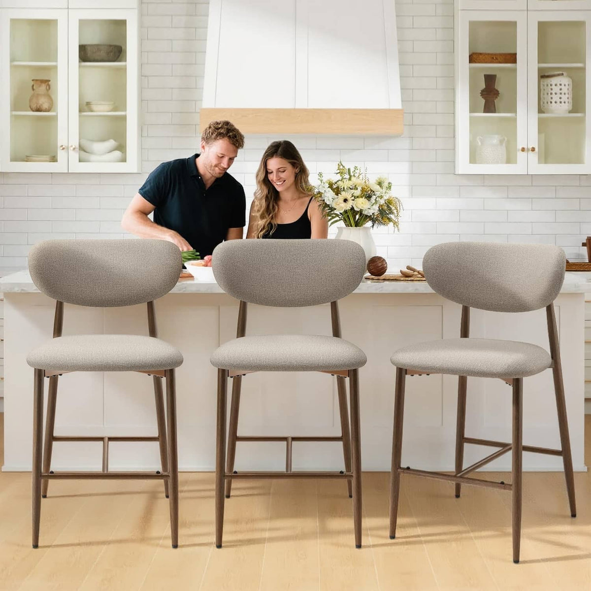 MALOL three counter-height bar stools with round gray seats, dark legs, and footrests