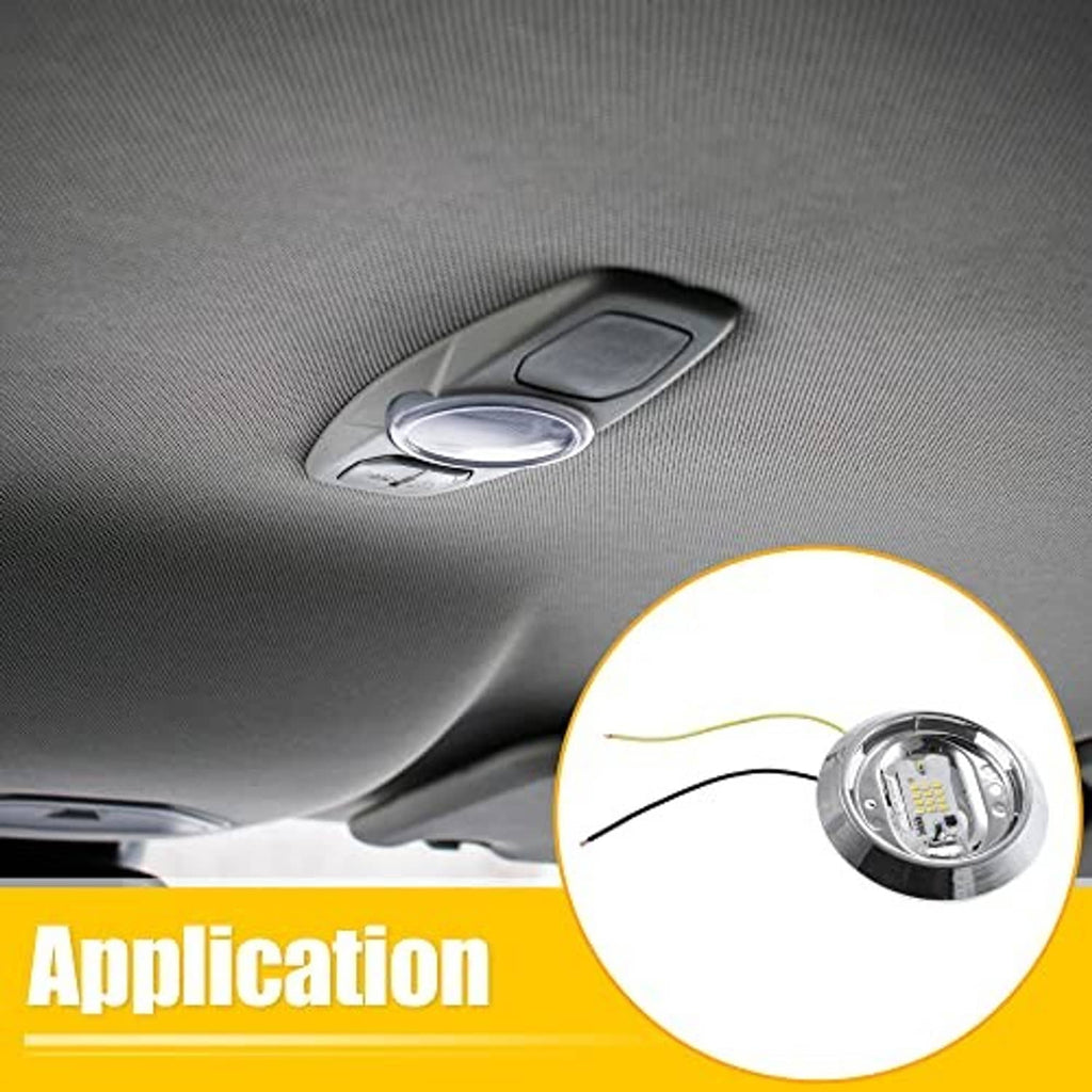 Round dome LED interior lamp with chrome rim installed in car headliner