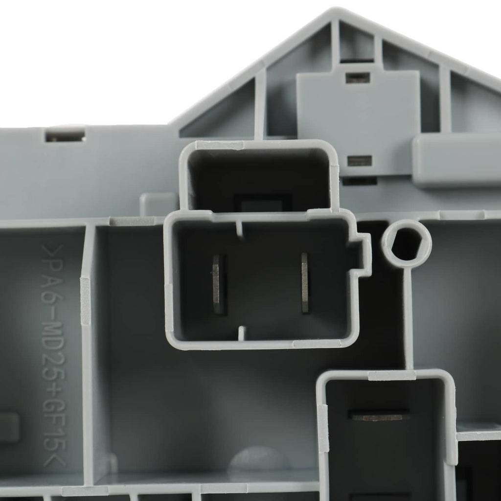 Close-up of gray power distribution center sockets and connector openings
