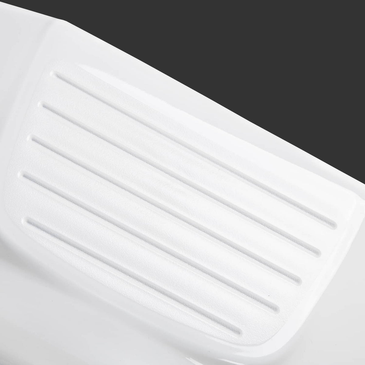 White plastic trailer fender with raised ribbed vent detail on top