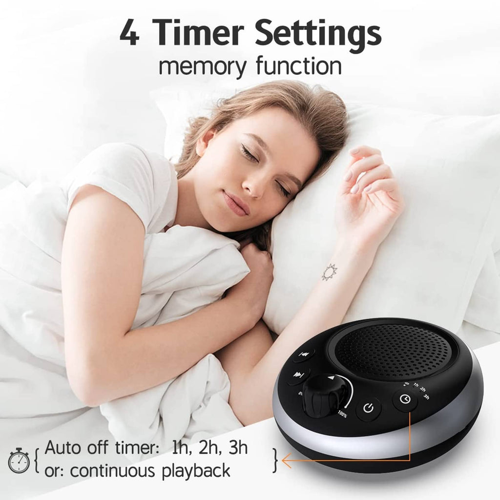 White noise machine with speaker grille and front volume dial on top of device