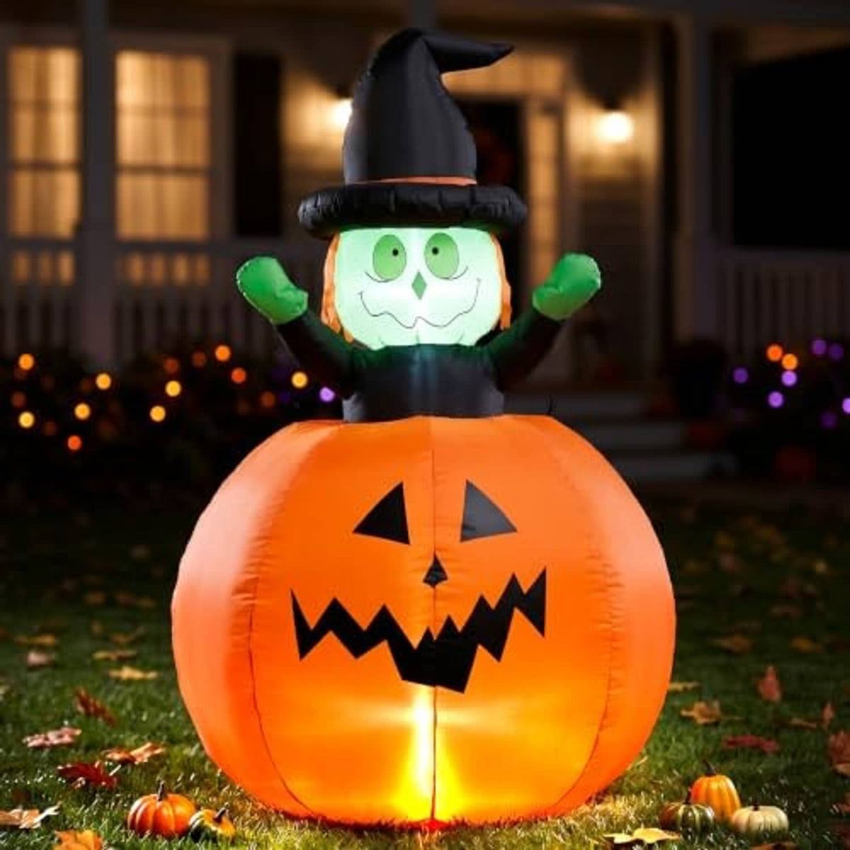 Halloween inflatable pumpkin witch decoration with glowing orange jack-o-lantern and black witch hat