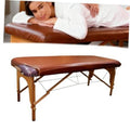 Brown PU vinyl massage table cover, fitted over a square massage bed