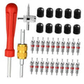 Tire valve core tool kit with red handle, gold adapter, and multiple valve cores