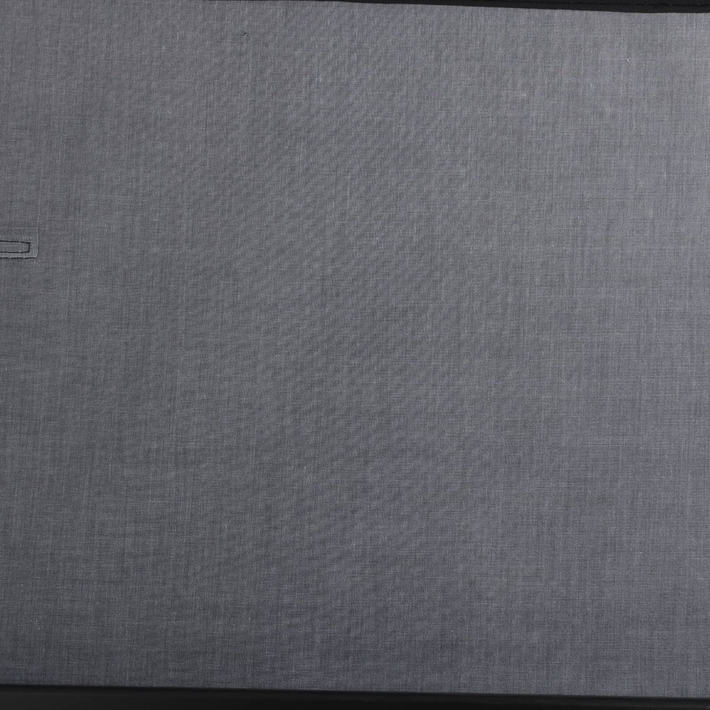 Rear trunk security shade panel, textured gray fabric surface