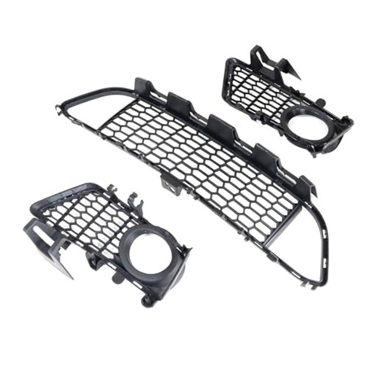 Pair of front bumper lower grilles with black honeycomb mesh and round fog-light openings