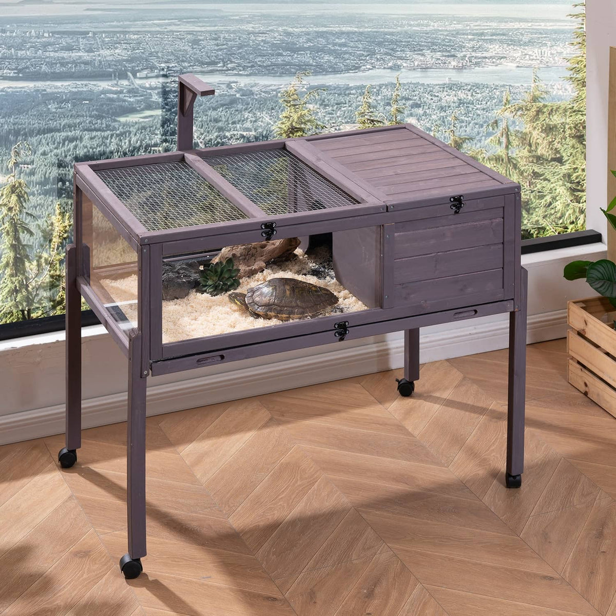 Gray wooden tortoise habitat with metal mesh top, front door, and reptile enclosure
