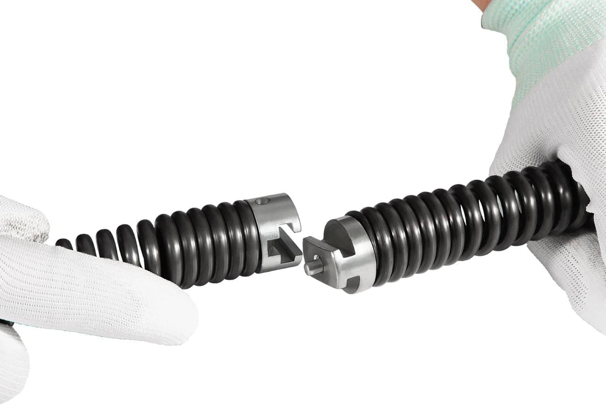 Drain cleaning cable end coupling with interlocking metal connectors and black coils