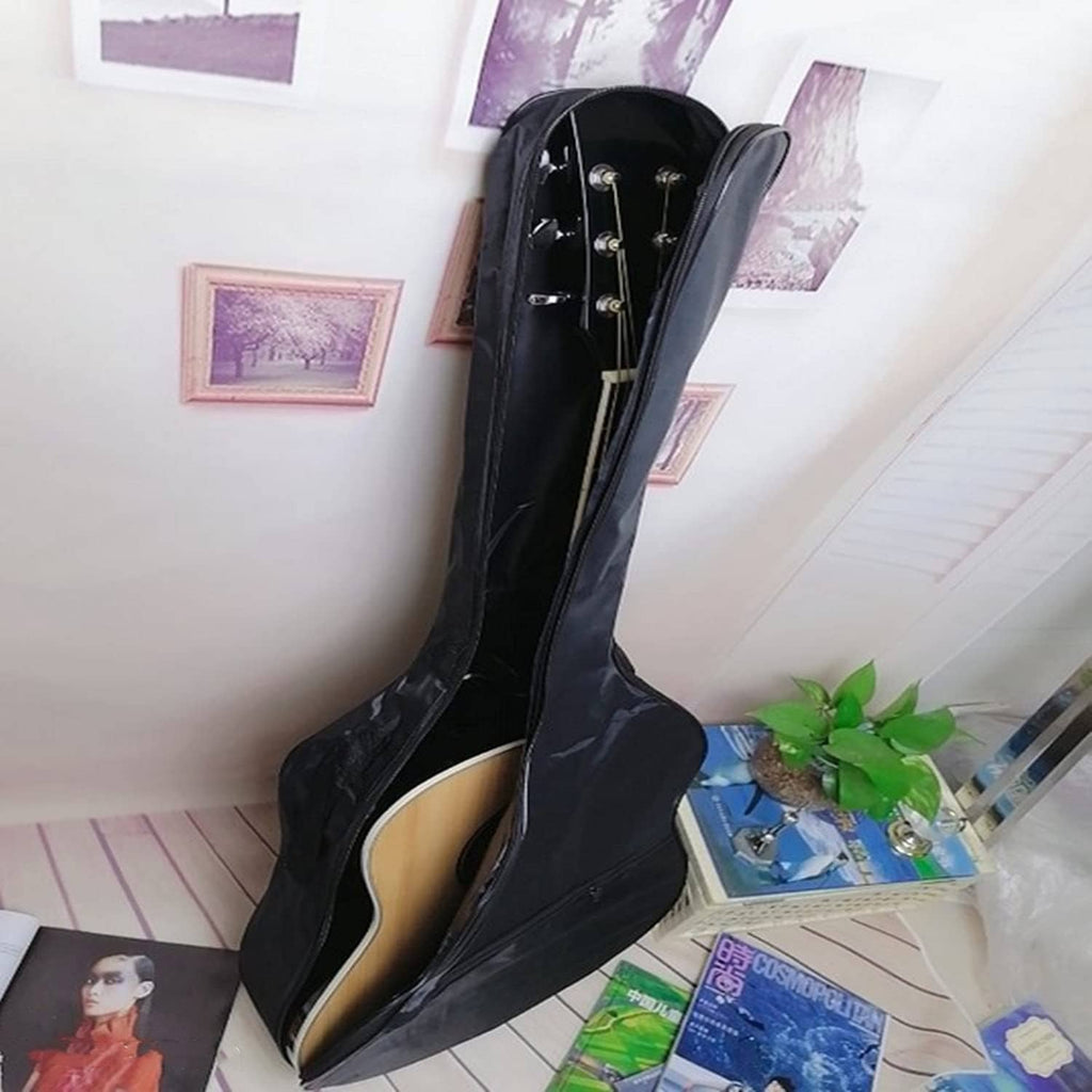 Black acoustic guitar bag standing upright with guitar inside