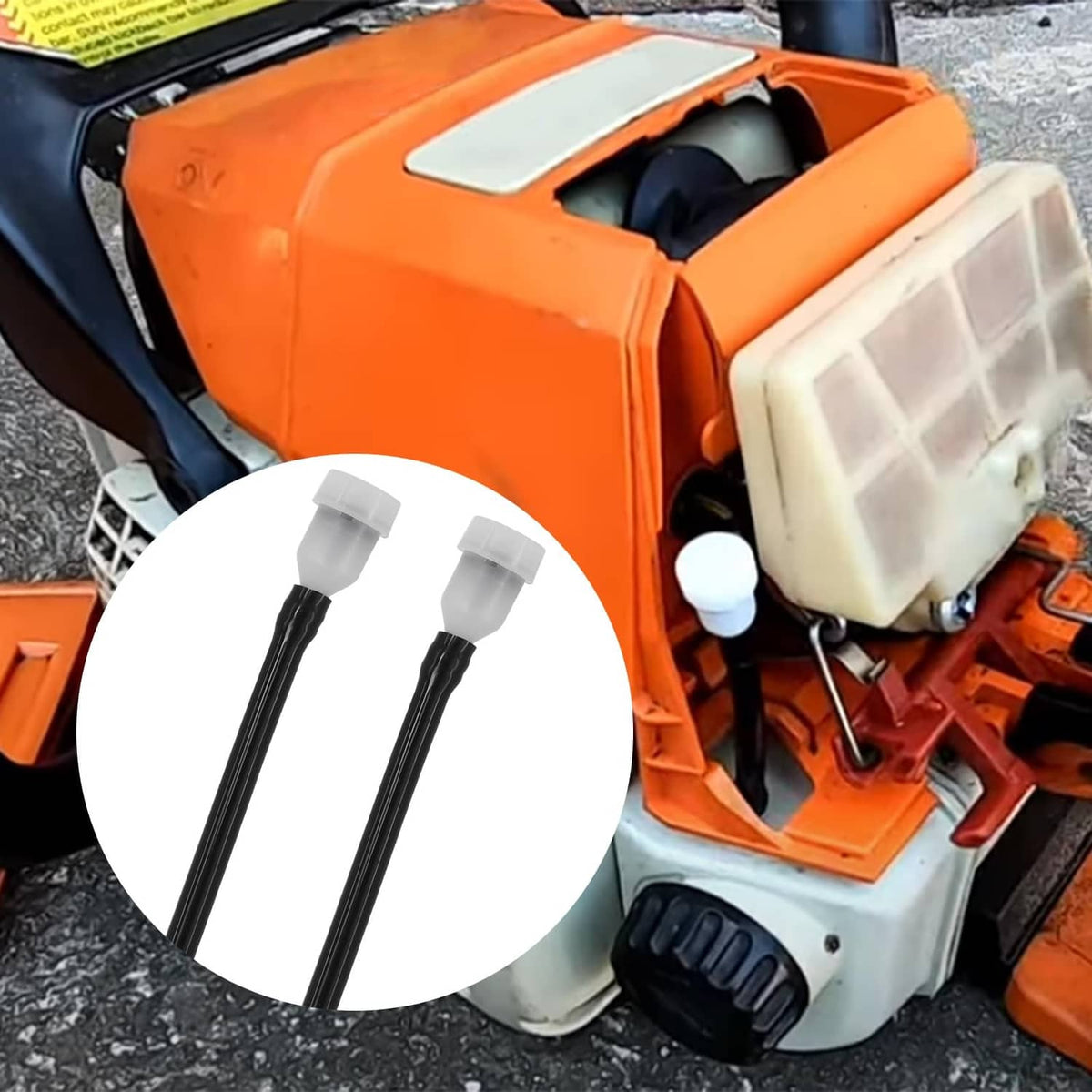 Fuel tank vent line installed on orange chainsaw, two hoses with white fittings