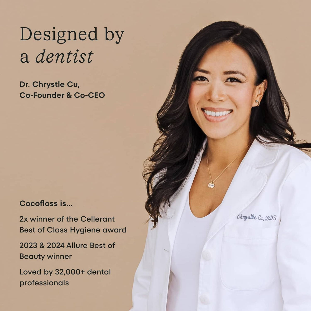 Dentist in a white coat holding COCOLAB dental floss marketing card
