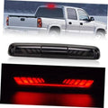 Rectangular third brake light bar with red LED glow.