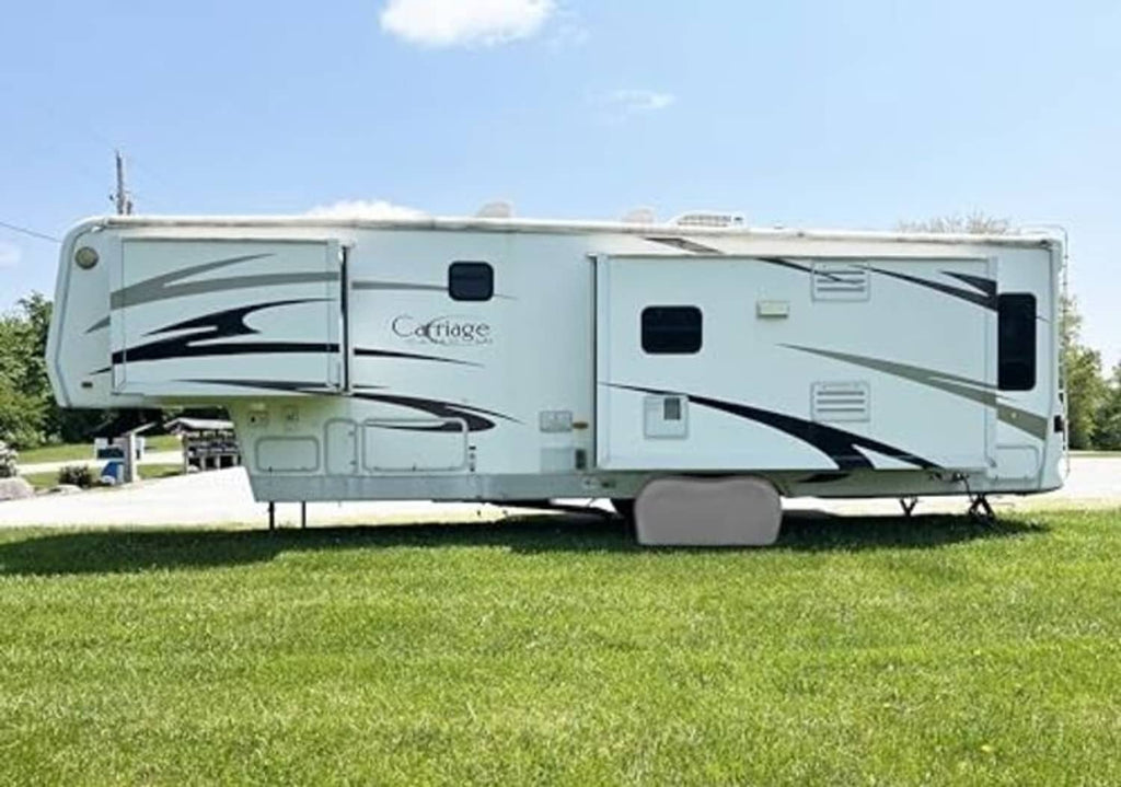 Camper trailer with dual wheel tire cover area not clearly visible from this angle