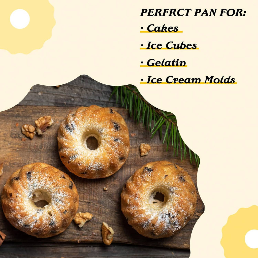 Mini fluted tube cake pan with 6 cavities, with three browned ring cakes