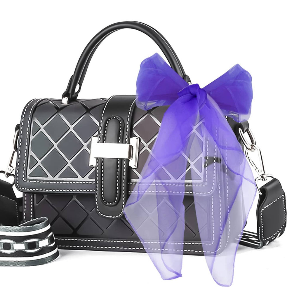 Purple sheer silk dance scarf tied with a bow on a handle