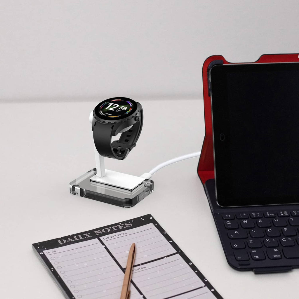 White and clear 4-pin smartwatch charging stand with cable connected.
