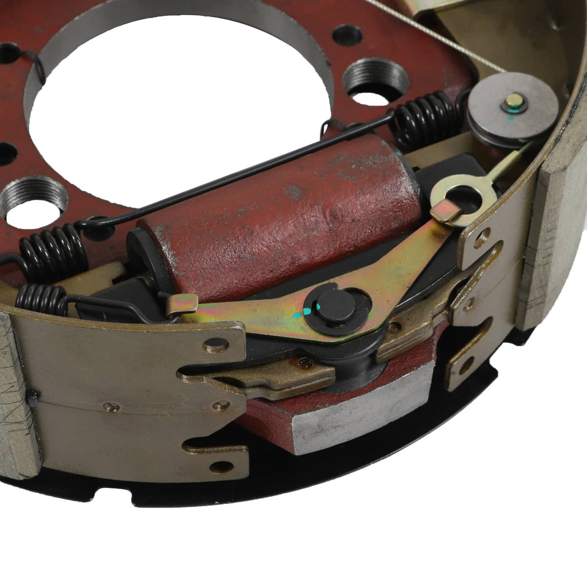 Hydraulic trailer brake assembly with red brake shoes, springs, and mounting hardware