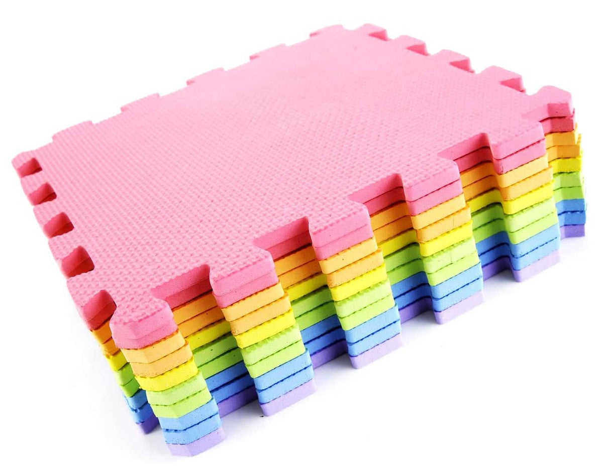 Interlocking foam mats with layered stack in pink, purple, yellow, green, and blue