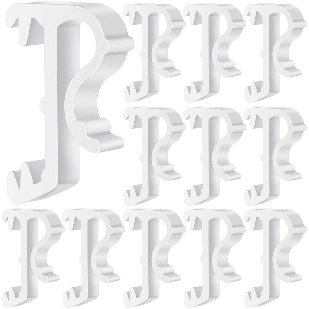 Set of white plastic valance clips with J-hook mounting shape